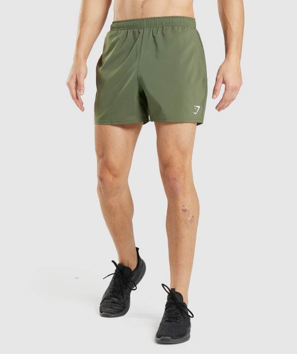Panske Šortky Gymshark Arrival 5" Olivovo Zelená | KF1579042